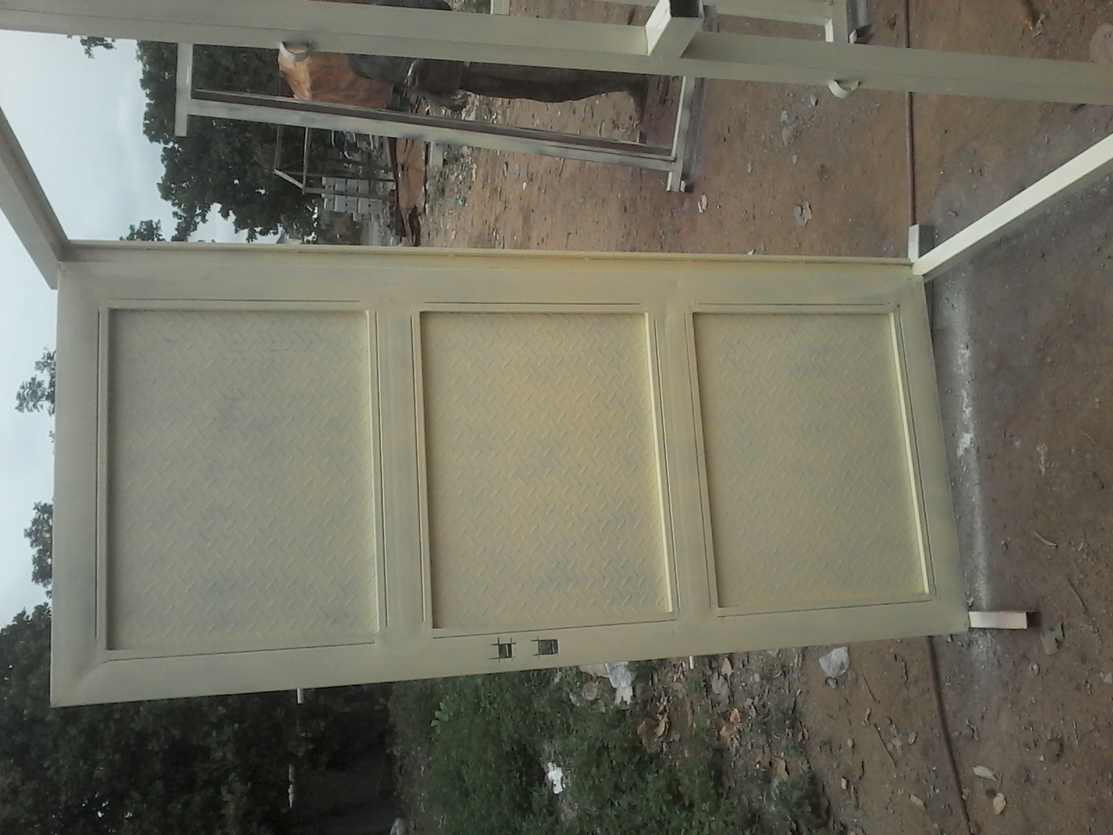 Security Door with Recessed Panels – Beige Primer Finish