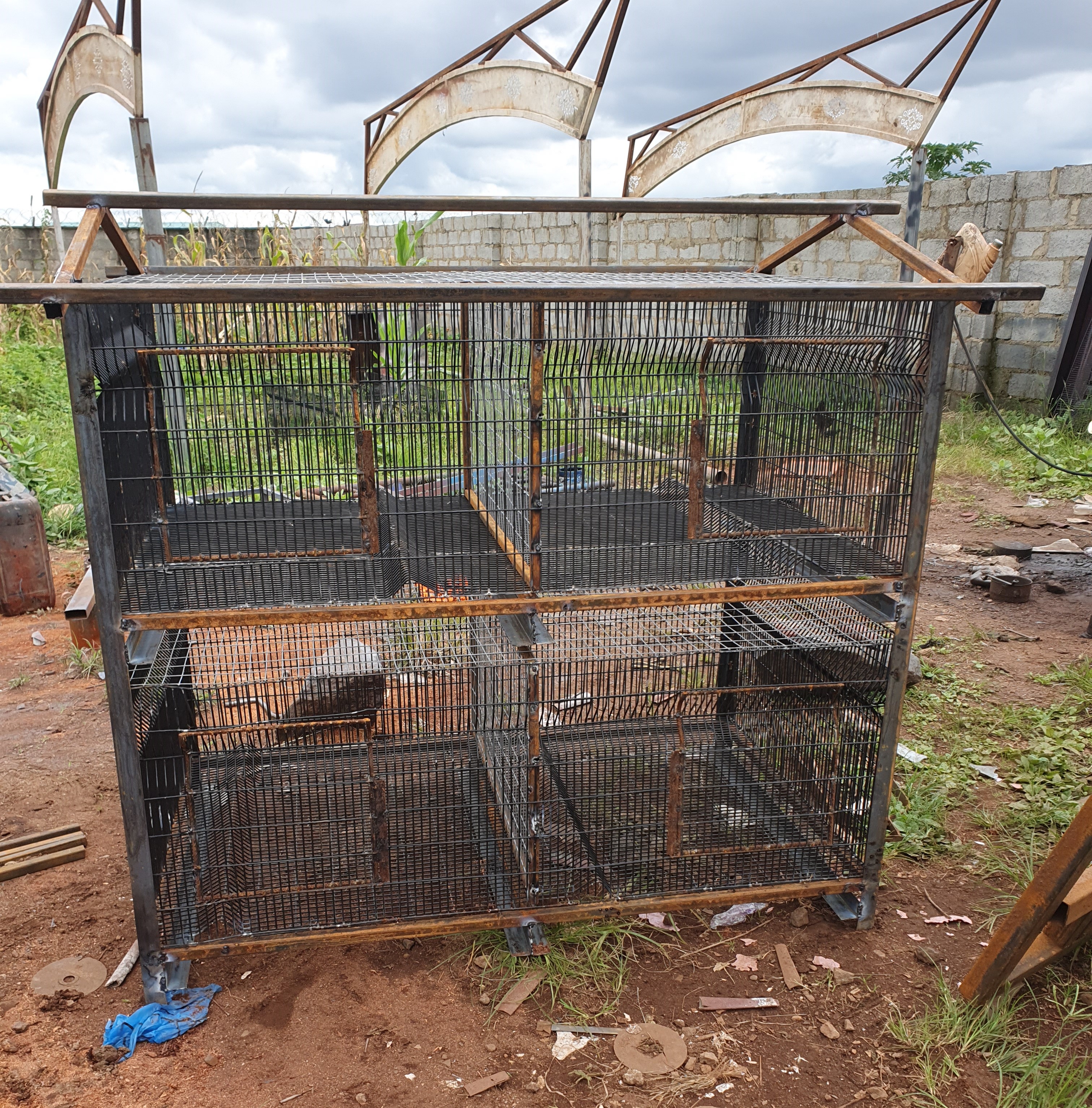 Heavy Duty 4-Tier Welded Metal Battery Cage – 8 Compartments