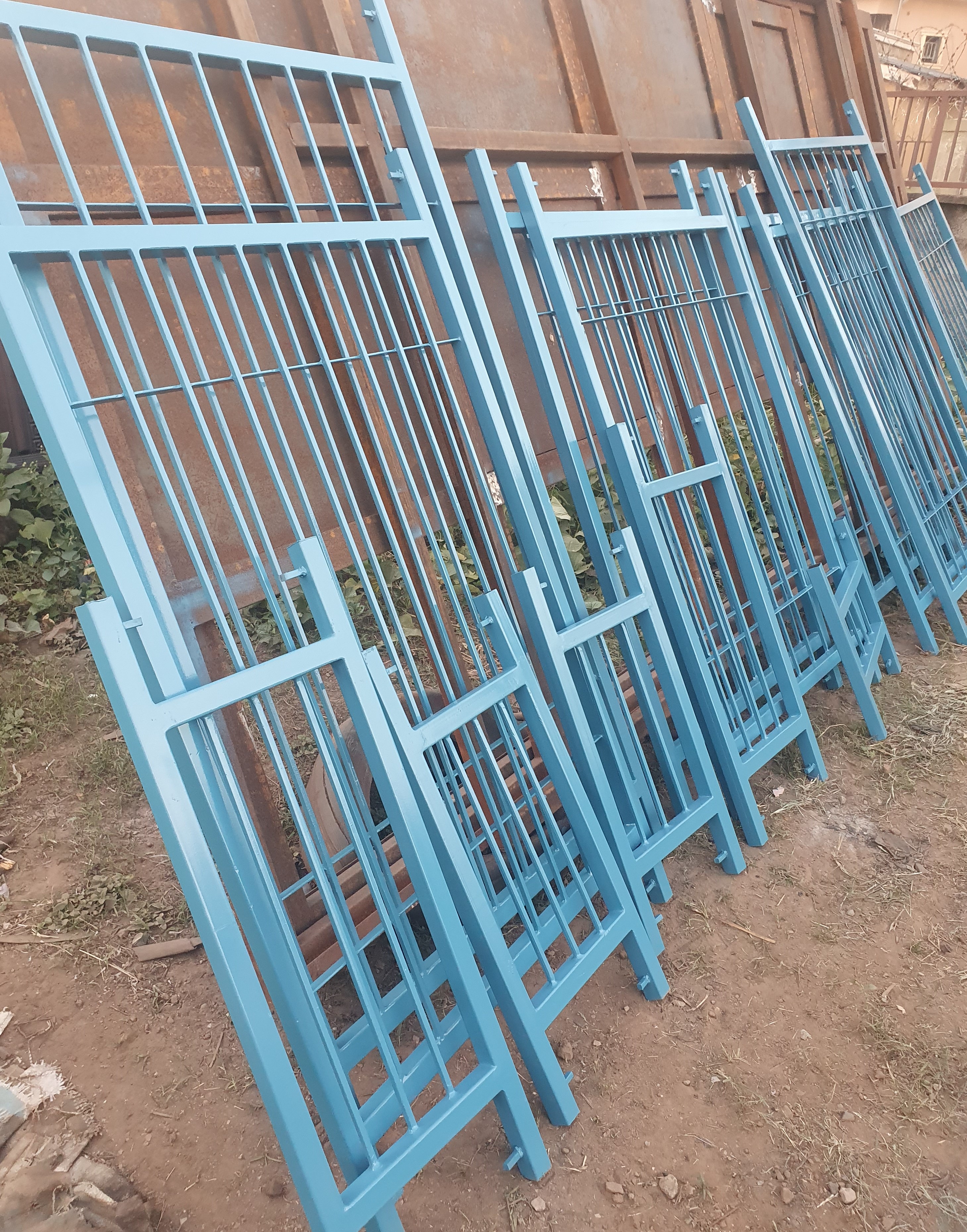 Light Blue Steel Security Gate Panels with Grid Design