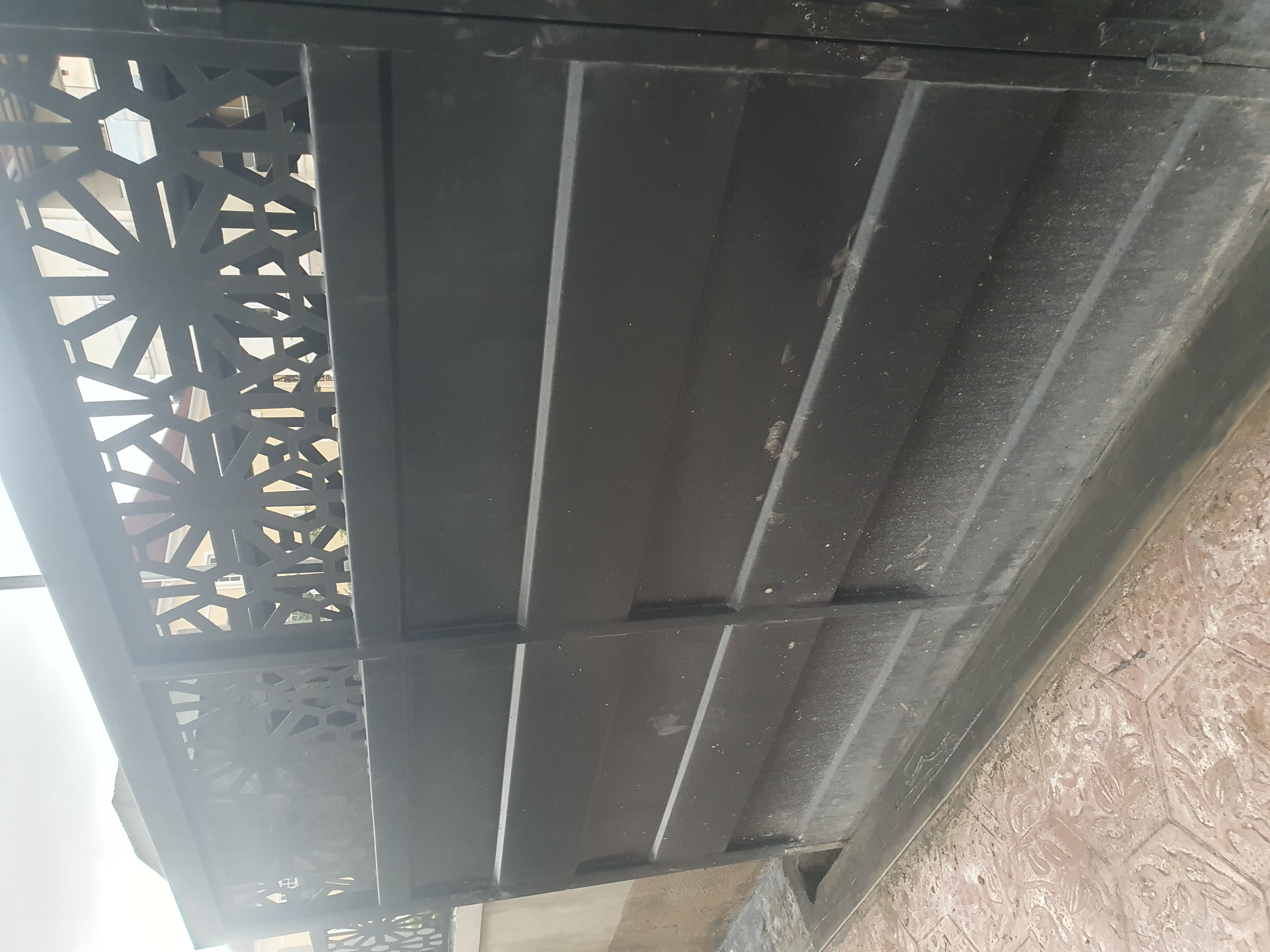 Modern Black Steel Gate with Geometric Starburst Cut-Outs – Sleek Contemporary Security Gate