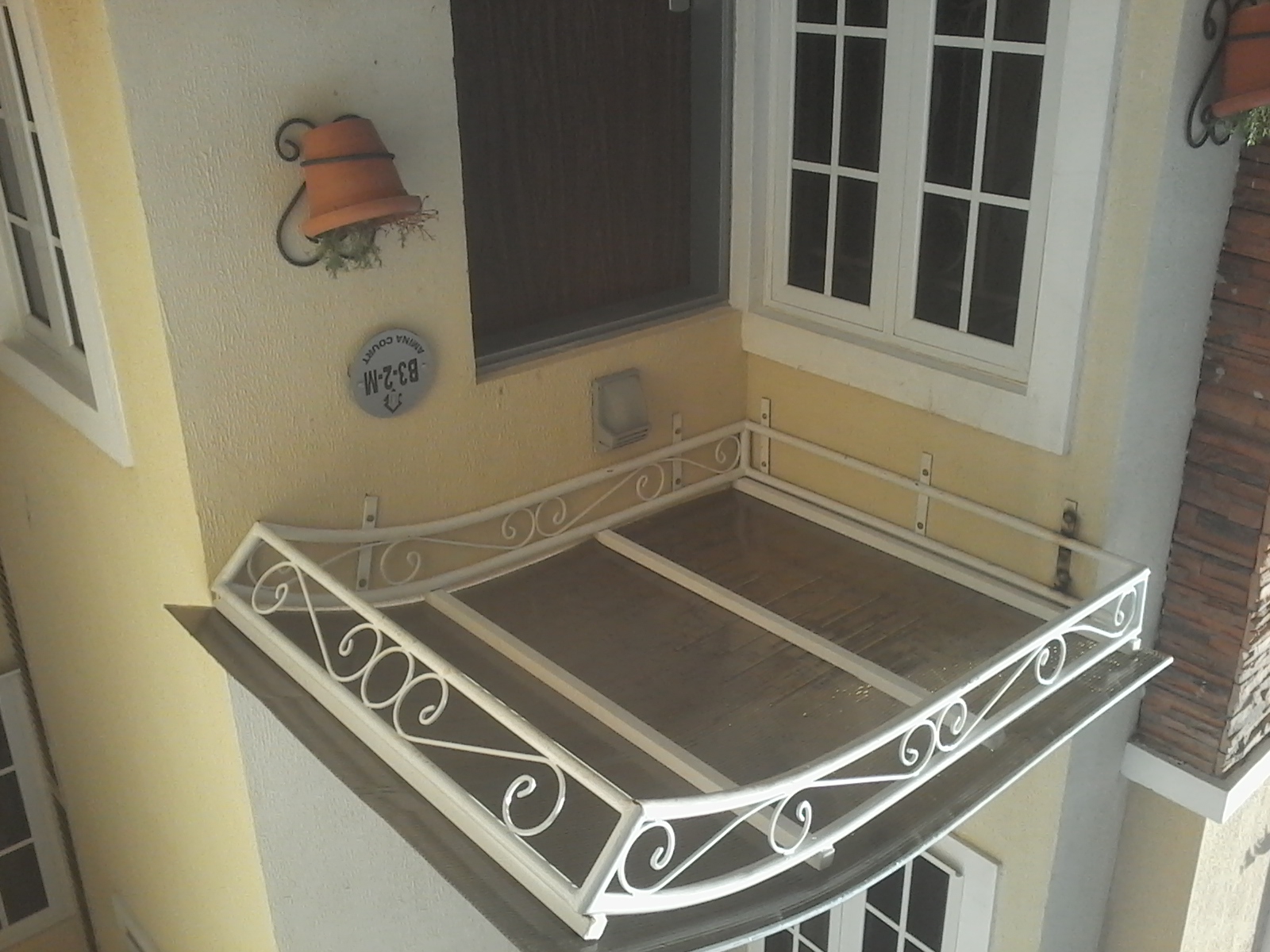 Ornamental Arched Entrance Canopy with Scroll-Design Frame – White Powder-Coated