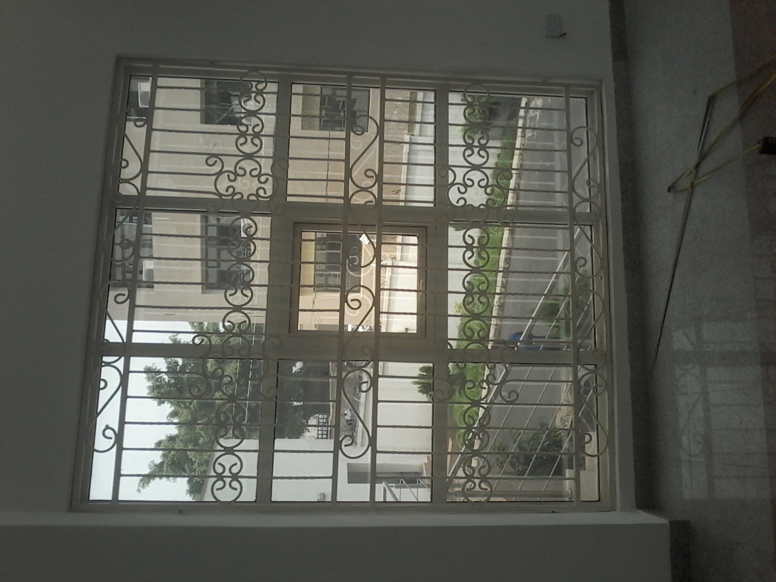 Ornamental Security Window Grille – Decorative Burglar Proof with Scroll Motif