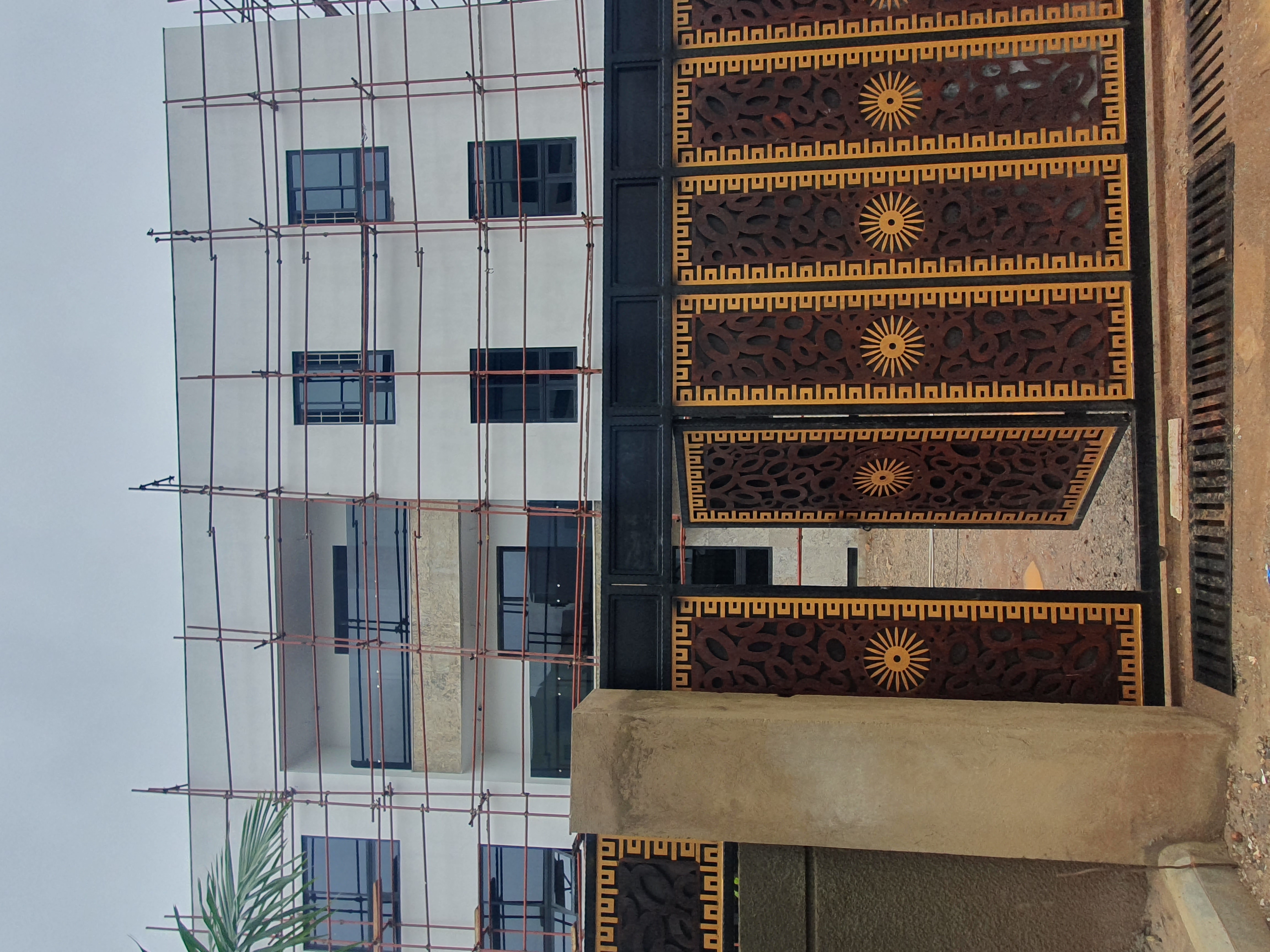 Ornate Double Swing Main Gate with Sunburst & Greek Key Motifs – Premium Black & Gold Statement Entrance