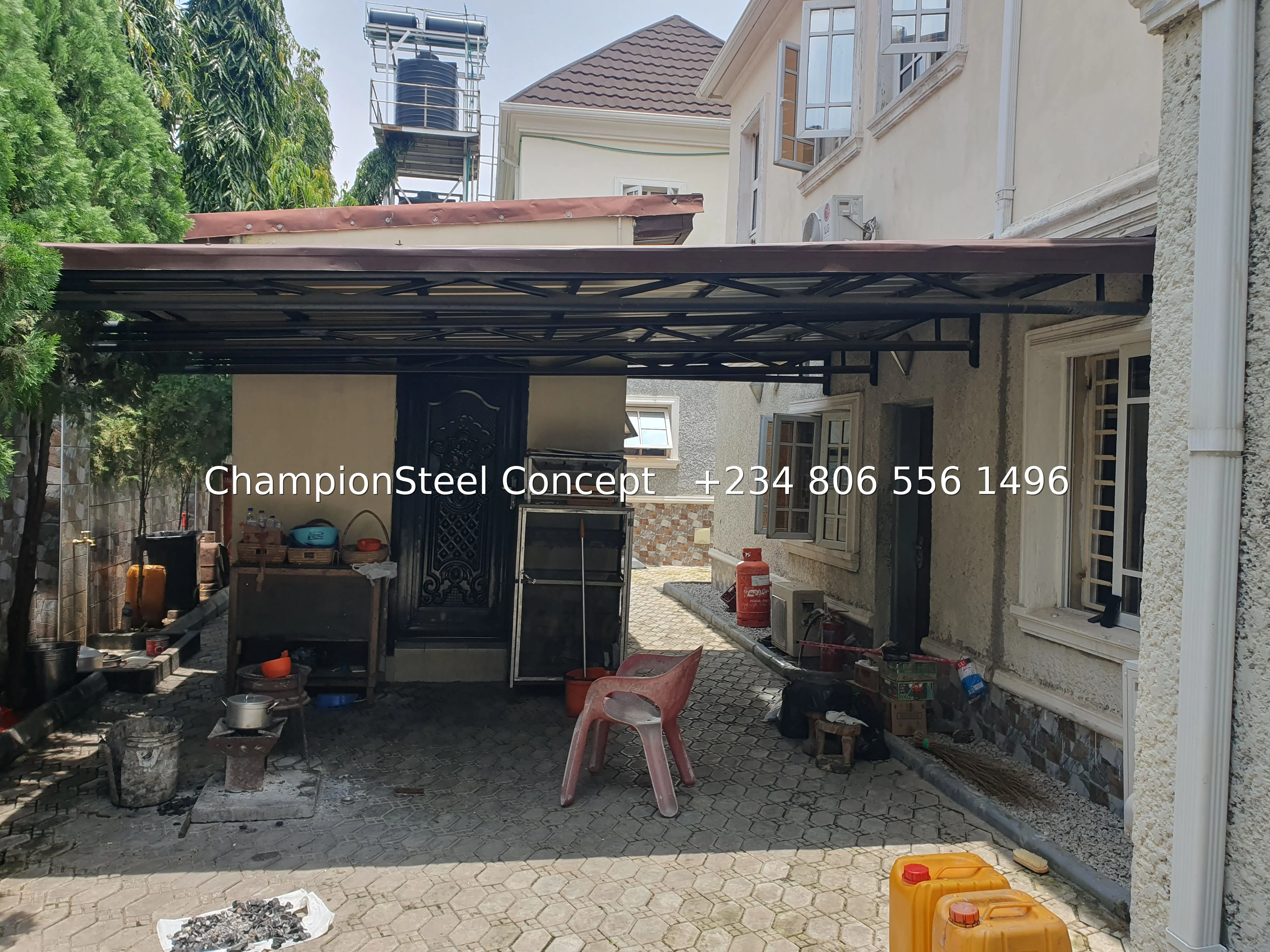 Heavy-Duty Black Steel Carport & Outdoor Kitchen Canopy – Functional Shade & Utility Structure