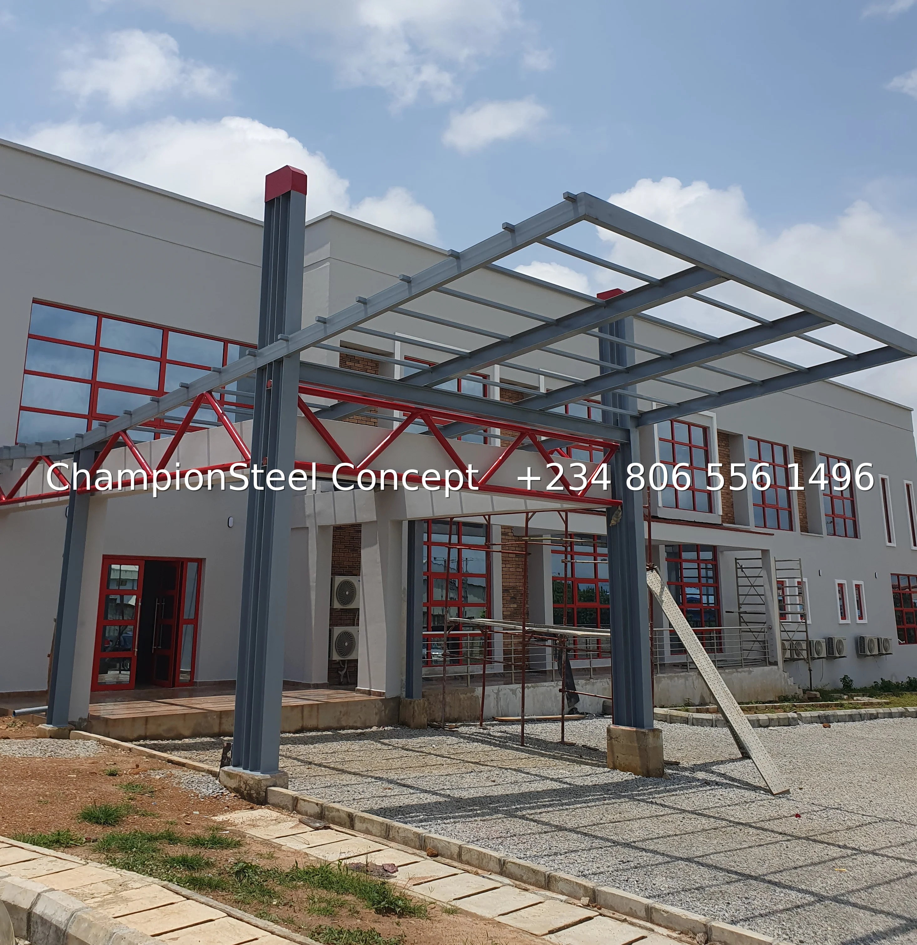 Modern Steel Entrance Canopy with Red & Grey Truss Design