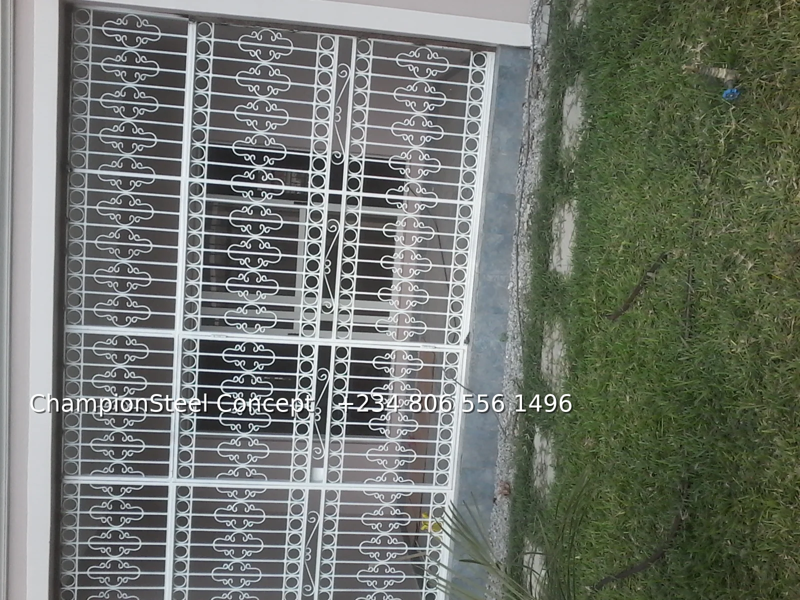 Ornamental White Scroll-Design Security Grille – Full-Width Sliding Door Protection