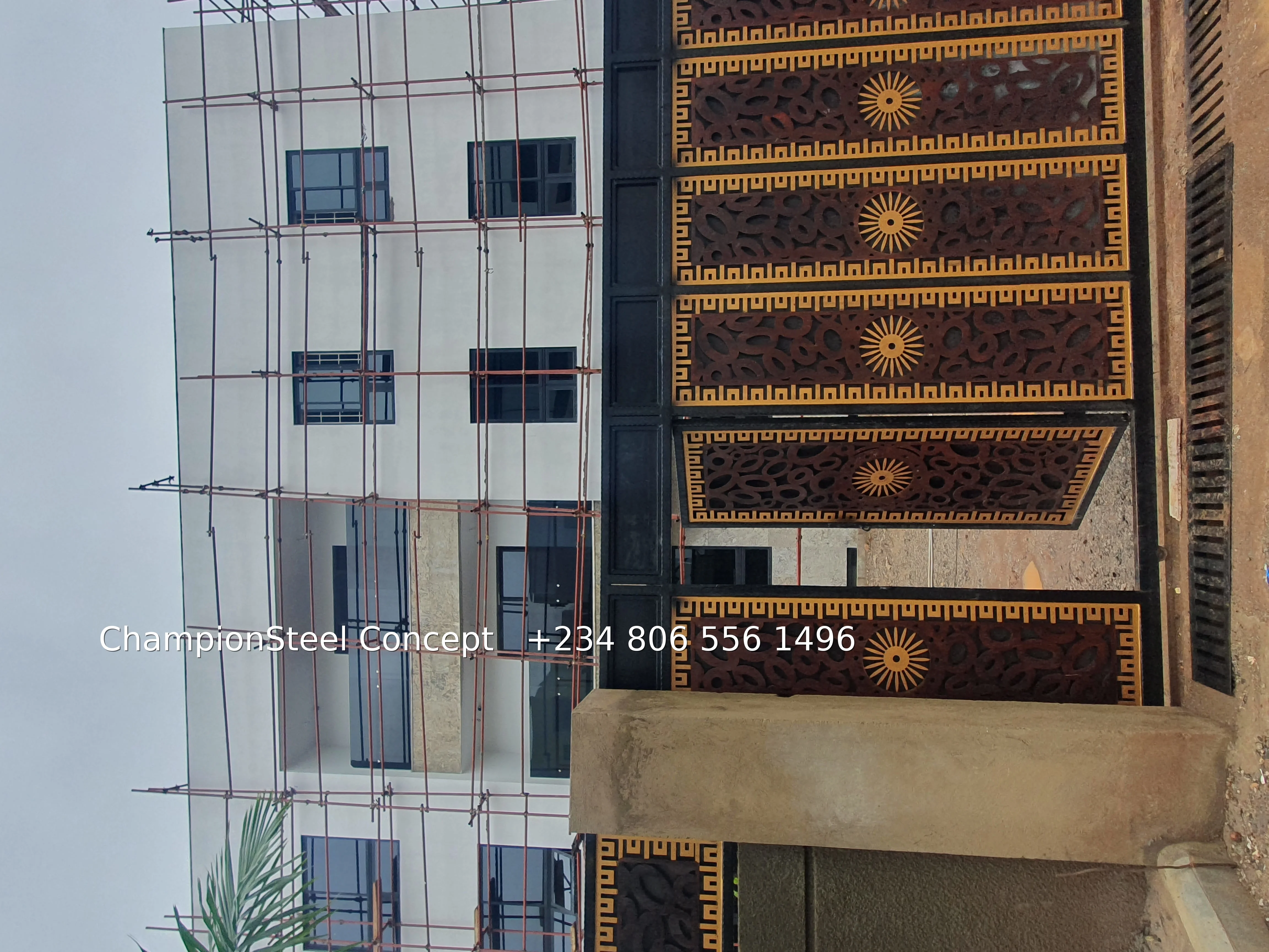Ornate Double Swing Main Gate with Sunburst & Greek Key Motifs – Premium Black & Gold Statement Entrance